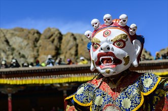 Monk performing ritual mask dance