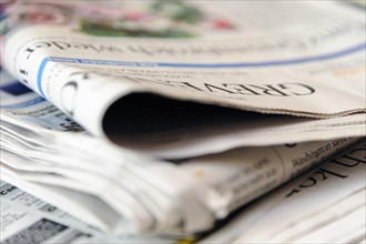Folded newspapers