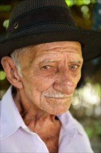 Elderly man with a hat