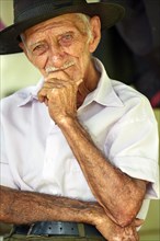 Elderly man with a hat