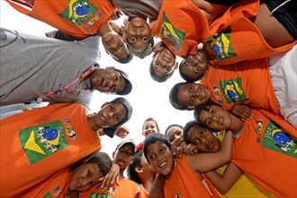 Boys of a football team forming a circle