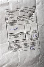 Stamp with a customs declaration on a postal item from Hong Kong declared as a gift