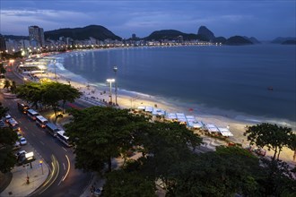 Copacabana beach and Pao de Acucar or Sugar Loaf at night
