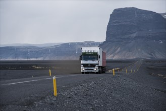 Truck driving along the Hringvegur or Ring Road