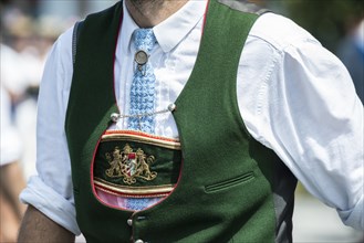 Man in lederhosen and a traditional waistcoat