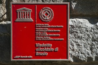 UNESCO plaque on the circular viaduct of Brusio