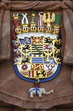 Heritage-protected crest on the District Court building