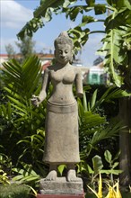 Sculpture of a Khmer woman in the court of the Cambodian National Museum