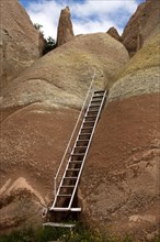 Ladder on a hiking trail through tuff formations
