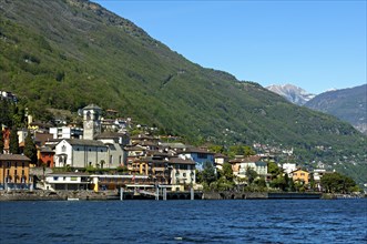Lake view of Brissago with the Parish Church of Saints Peter and Paul on Lake Maggiore