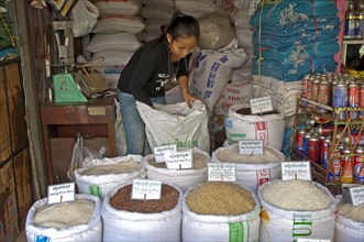 Rice vendor offering different varieties of rice at their stand