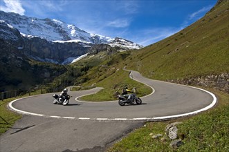 Motorcyclists in a hairpin curve