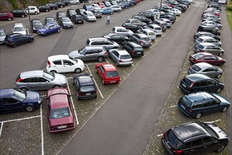 Car park with many parked cars