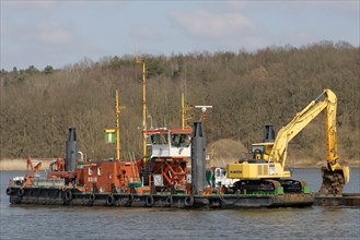 The working vessel 'Aegir' carrying a mobile backhoe