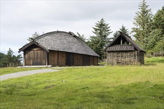 Reconstructed Viking farm with a long house and a fire building