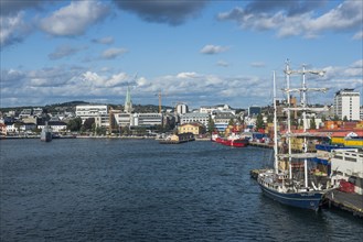 Harbour of Kristiansand with a sailing ship