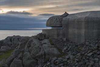 German bunker from World War II overlooking the sea in the evening light