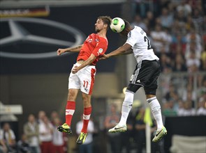 Aerial duel between the DFB national player Jerome Boateng