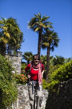 A woman hiking on the Scalinata della Ruga