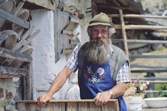 Man with a beard at Tallneralm alp at Mt Hirzer