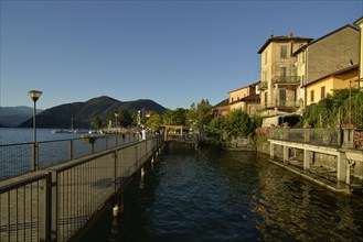 Promenade of Porto Ceresio on Lake Lugano or Lago di Lugano