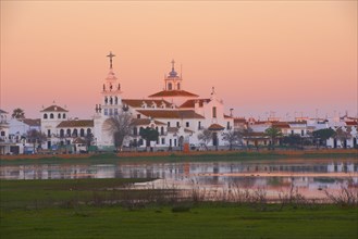 El Rocio village and Ermita del Rocio hermitage at sunset