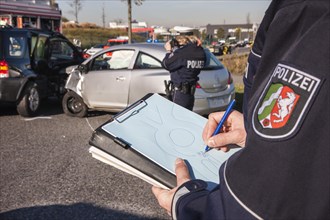 Police officer sketching the accident scene