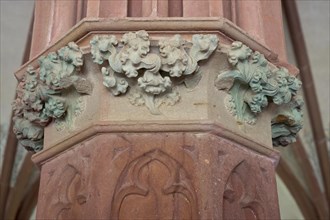 Gothic capital with floral ornaments made of sandstone