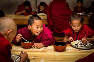 Young monks from Amitabha Monastery having lunch