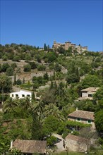 Townscape with the Charterhouse or Royal Carthusian Monastery of Valldemossa