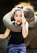 Elephant playing with tourist at an elephant camp
