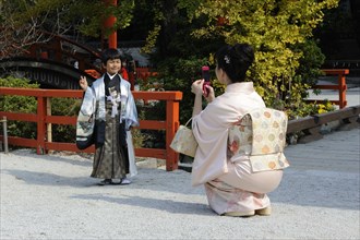 Japanese boy wearing an ornate Kimono