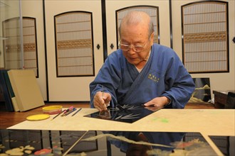 Japanese artisan in his workshop