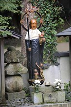 Buddhist Jizo statue with bib and halo