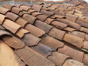 Roof tiles on an old house in Guillama