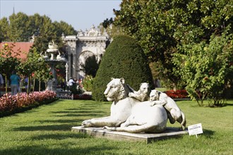 Stone lioness with cubs in the garden of Dolmabahce Palace