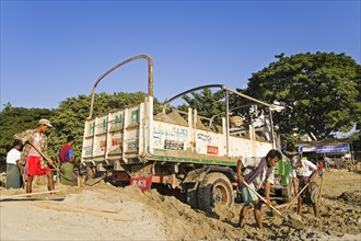 Sand being loaded on the banks of the Ayeyarwady River