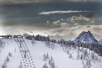 Chair lift on Eiberg Mountain in the Wilder Kaiser Ski World