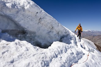 Mountain climber descending from Monte Cevedale