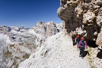 Mountain climbers during the ascent of Mt Tofana di Roze on the Via Ferrata Giovanni Lipella