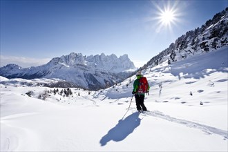 Cross-country skier descending from Juribrutto