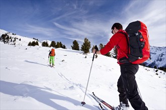 Cross country skiers near Peder-Stieralm mountain pasture