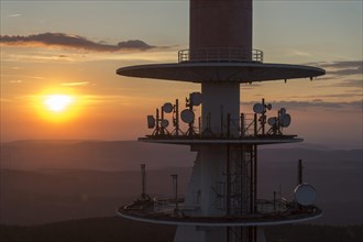 Transmission tower on the summit plateau of Mt Brocken at sunset