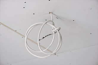 Electrical cable in a ceiling