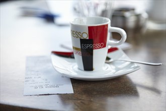 Espresso cup with receipt