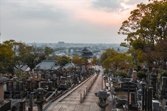City view with temple and cemetery of the cherry blossom