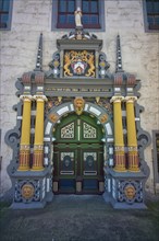 Portal with wood carving at the Town Hall