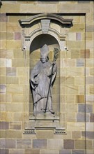 Statue of the monastery's founder Sturmius on the main portal of St. Salvator Cathedral of Fulda