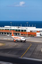 Airbus from easyjet.com in front of the terminal of Madeira Airport