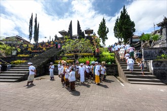 Worshippers gathering at the sacred temple of Pura Penetaran Agung Besakih